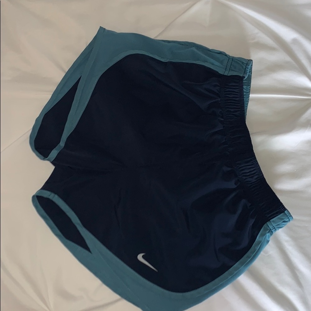 Navy blue nike running shorts
